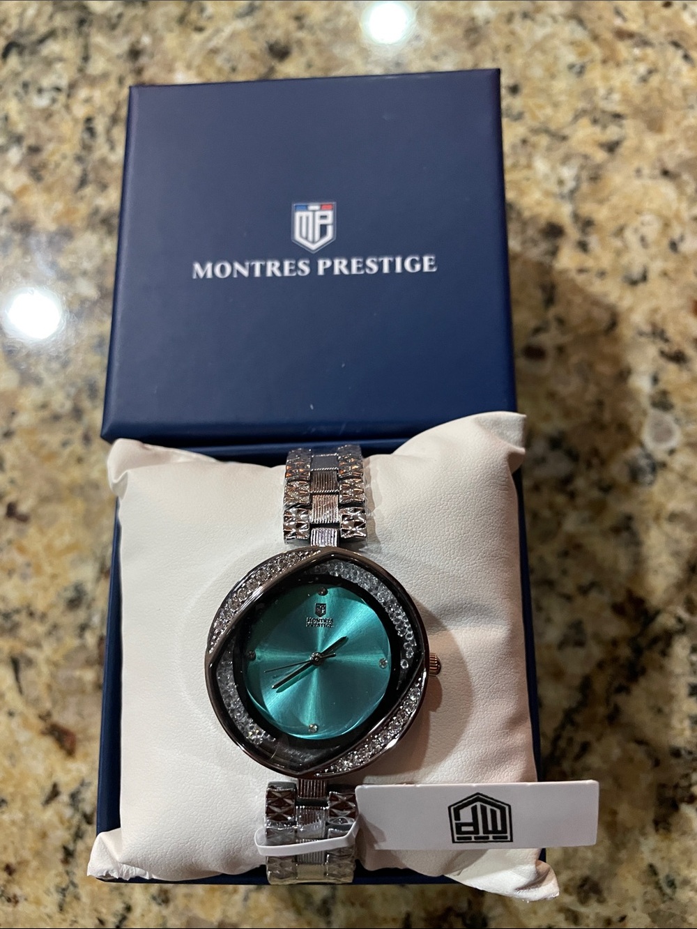 Montres Prestige Women’s Silver Bracelet Watch with Turquoise Dial